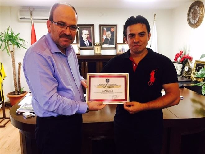 Dünya Yakın Savunma Federasyonu’ndan AK Parti İl Başkanı Akçay’a Onur Belgesi