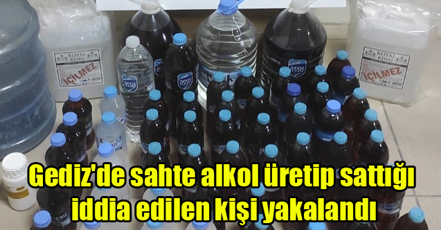 Gediz'de sahte alkol üretip sattığı iddia edilen kişi yakalandı