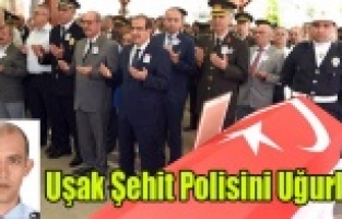 UŞAK ŞEHİT POLİSİNİ SON YOLCULUĞUNA UĞURLADI