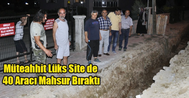 MÜTEAHHİT UYARMADAN YOLU KAZDI LÜKS SİTEDE ARAÇLAR MAHSUR KALDI